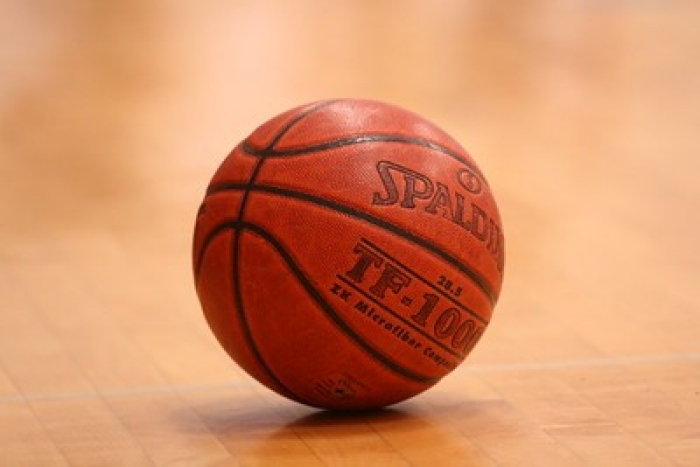 Photo of basketball on court