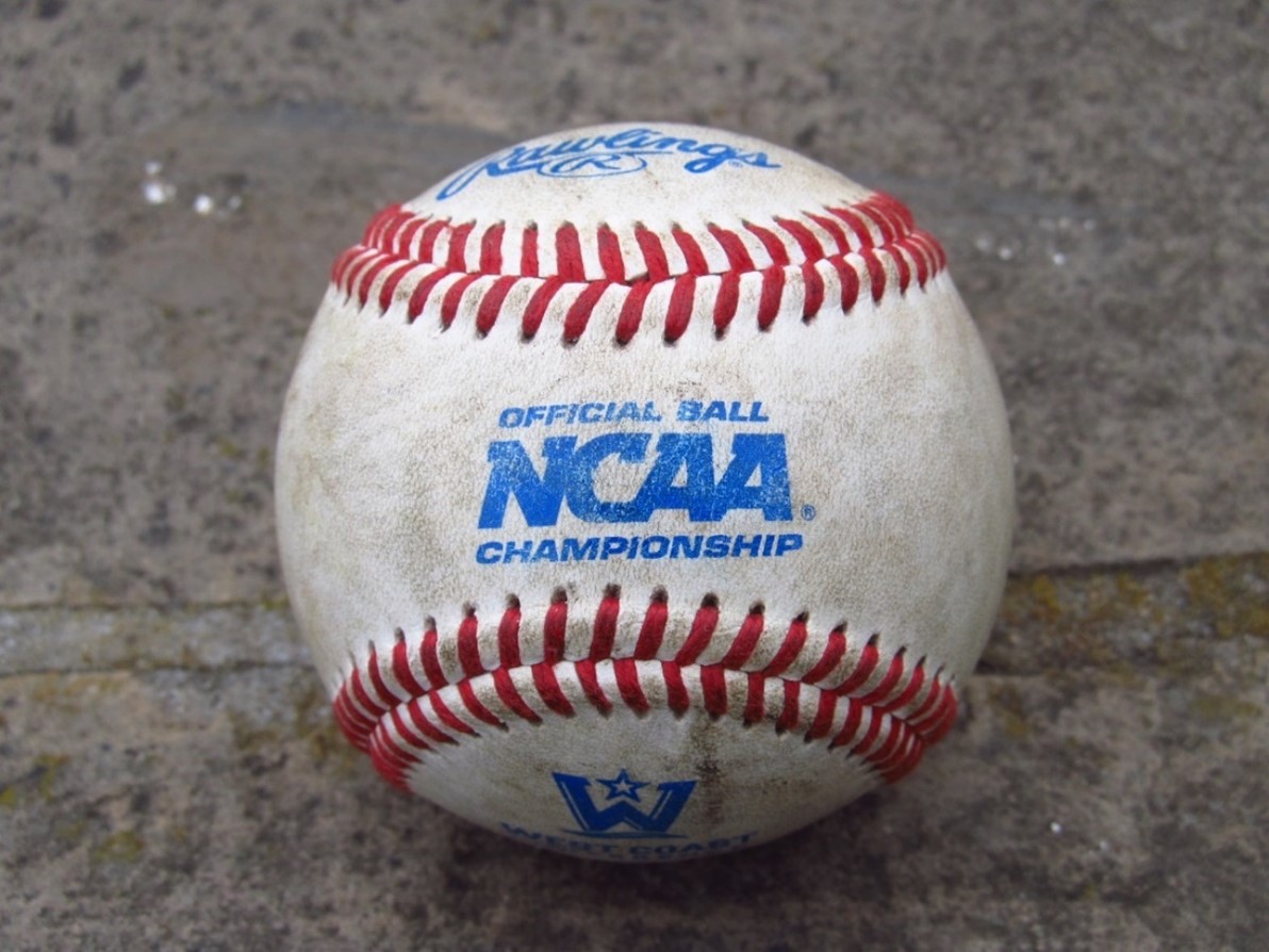 White baseball with red stitching and blue NCAA logo