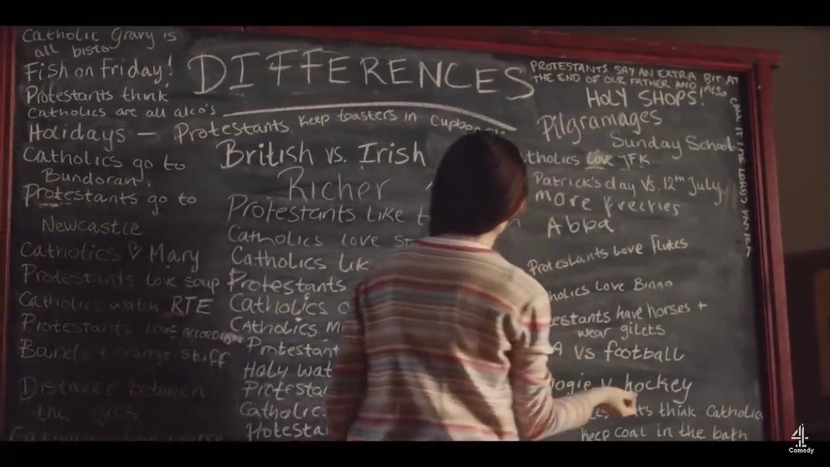 A blackboard with the word "DIFFERENCES" in chalk at the top. The rest of the board is covered with humorous differences between Catholics and Protestants, like "British vs. Irish: Richer"