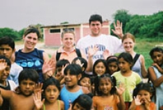 College of Nursing students travel internationally to promote health, seen here in Chulucanas, Peru, 2003.