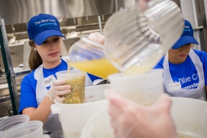 Senior Stephanie Harvey works in a soup kitchen as part of the IBC Blue Crew.