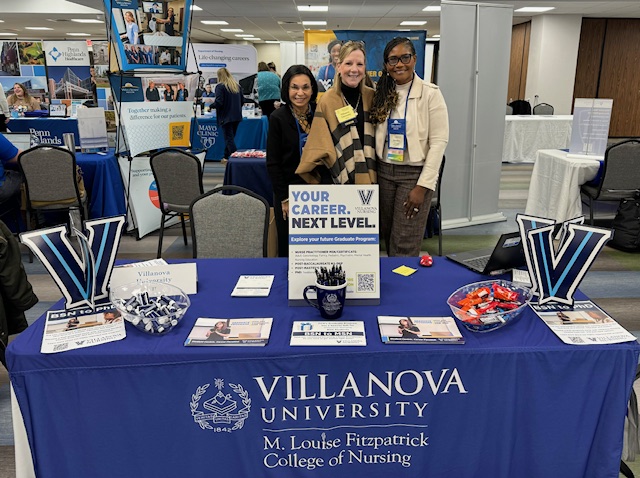 Dr. Weingarten, Cheryl Wert and Dr. Jennifer Brown in Exhibit Hall