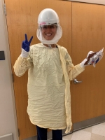 Female nurse wearing PPE.