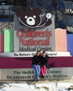 Two female nurses sitting outside of Children's National Medical Center