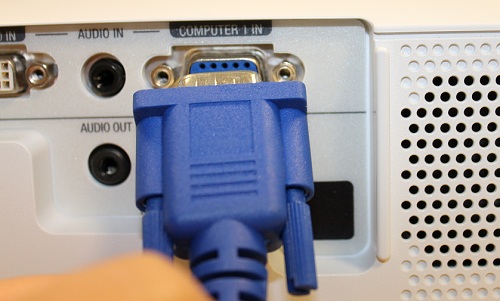 Step 4: Connect the video cable to the projector, making a note of which port it is connected to. (In this example, the port is named 'COMPUTER 1 IN')