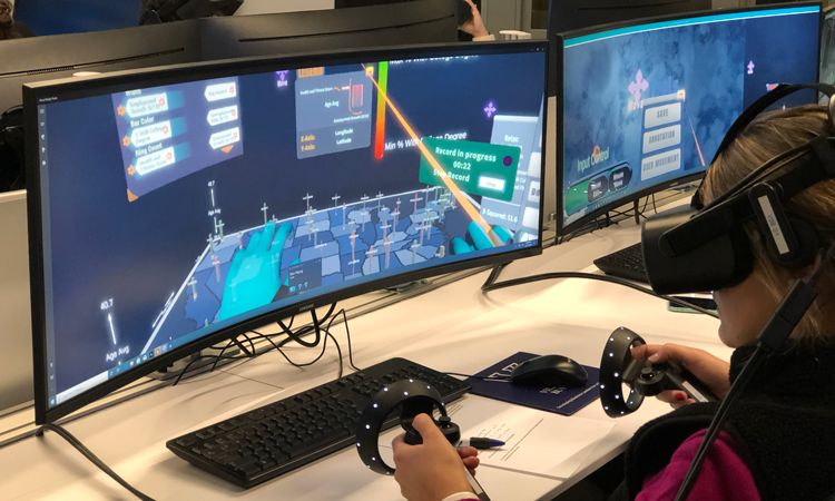 Student at Desk in VR gear