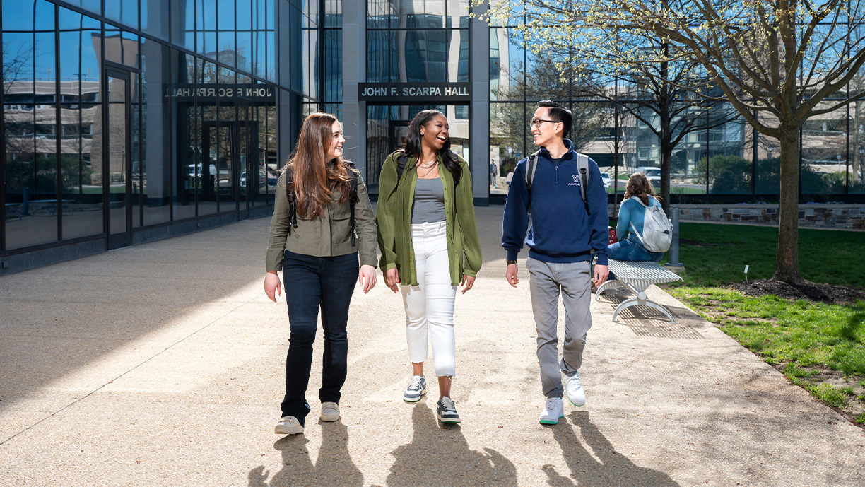 Law students walking outside of John F. Scarpa Hall