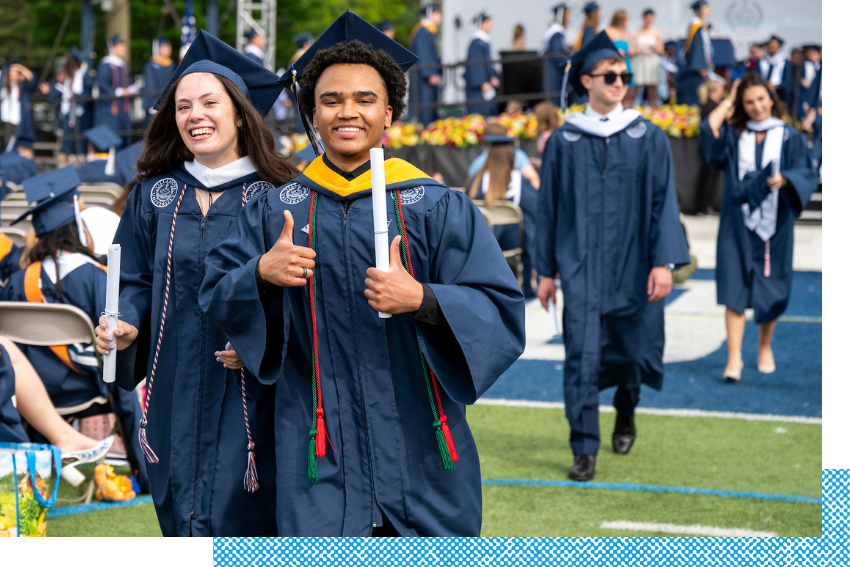 Students walking during graduation.