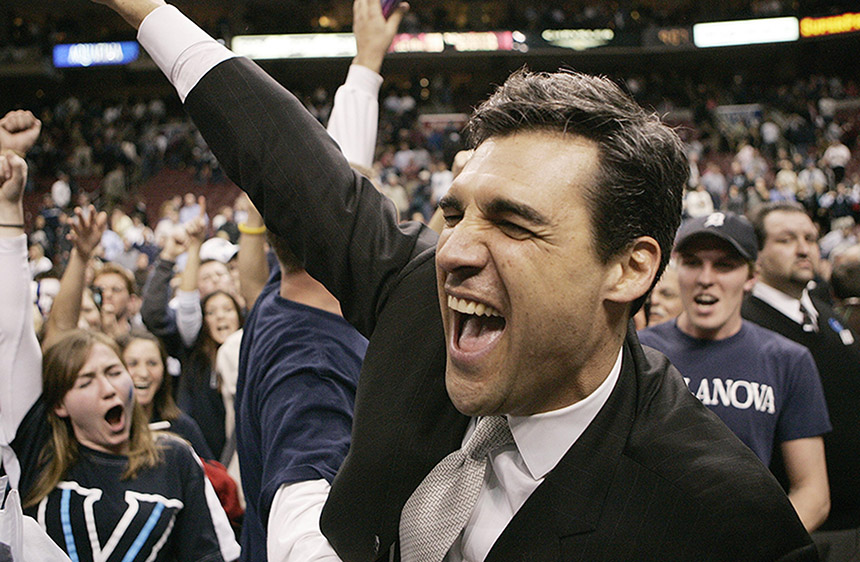 Head coach Jay Wright of Villanova University gestures in a crowd of fans as he celebrates a win in 2006