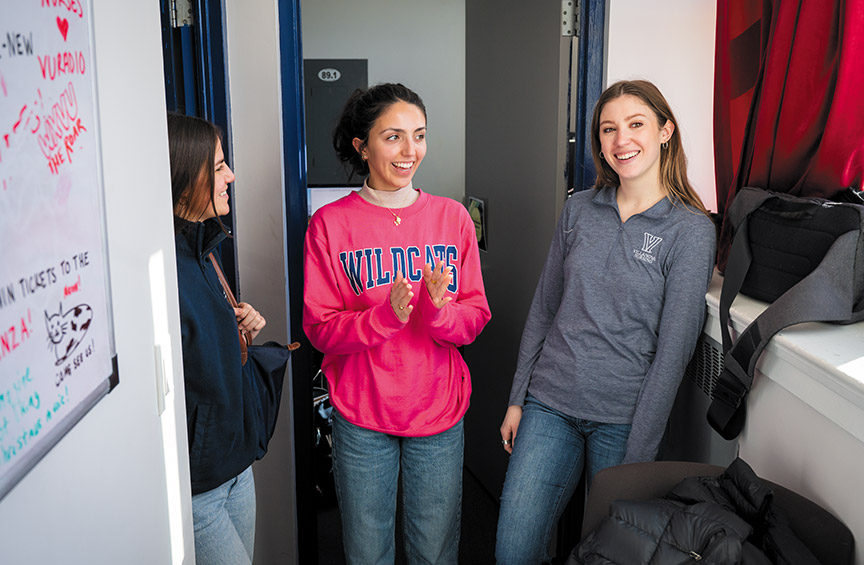 three Nursing students stand in the WXVU studio