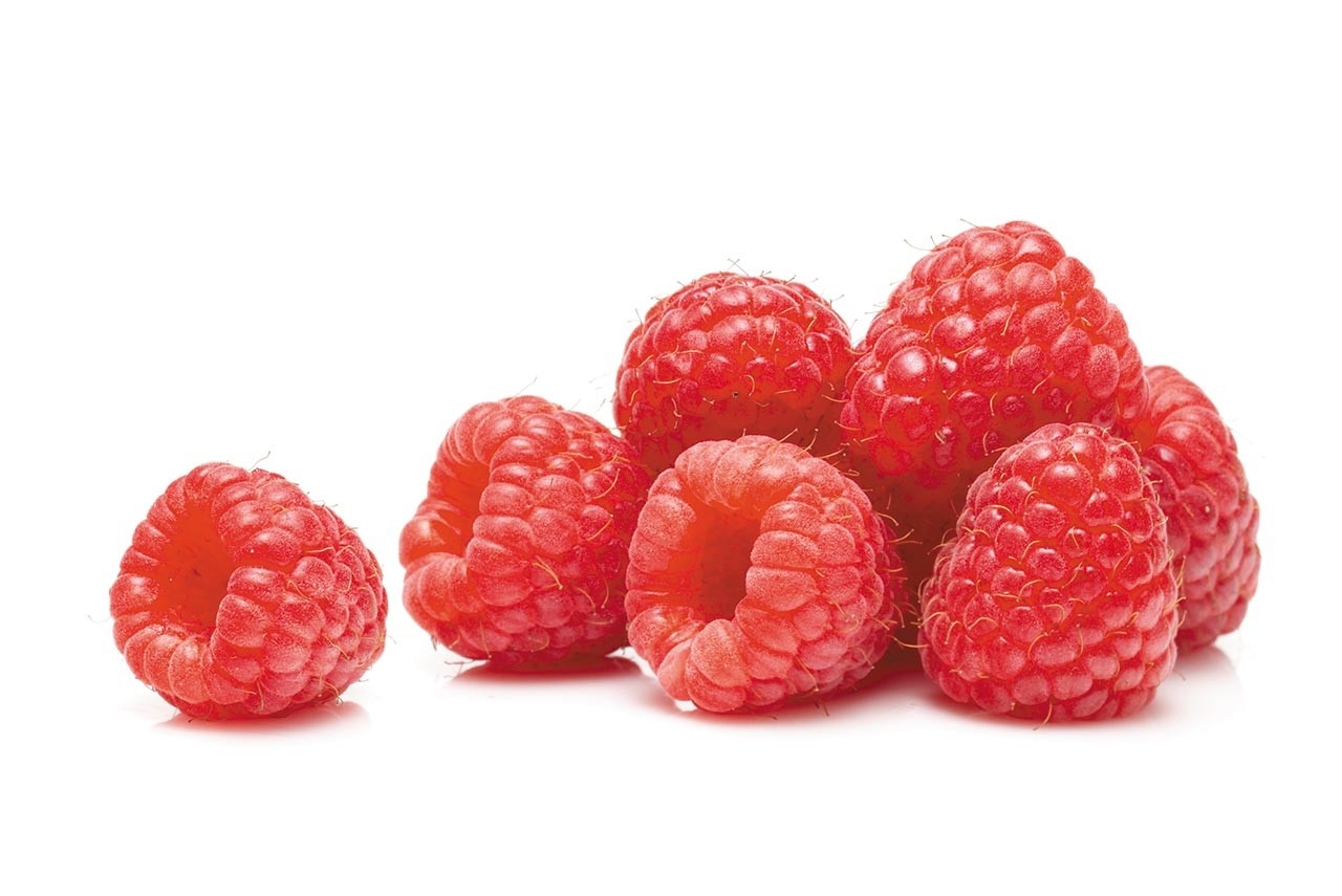 a little pile of red raspberries