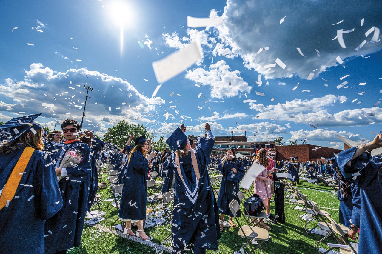 confetti falls as Villanova graduates celebrate commencement on a sunny day