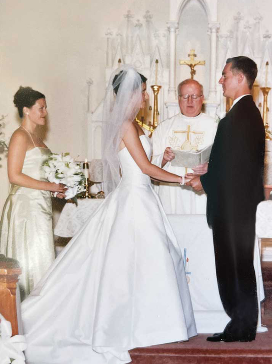 the Rev. John P. Stack celebrating a Catholic wedding ceremony