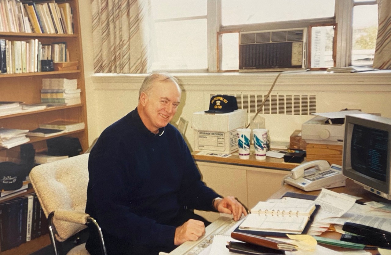 Fr. Stack in his office in the early 1990s