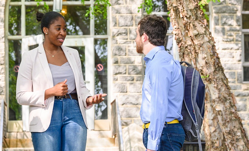 Students talk outside