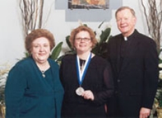 College of Nursing 50th Anniversary Medallion recipient Dr. Donna Zimmaro Bliss, BSN ’81 with Dean Fitzpatrick and University President Rev. Edmund J. Dobbin, OSA. April 26, 2004.