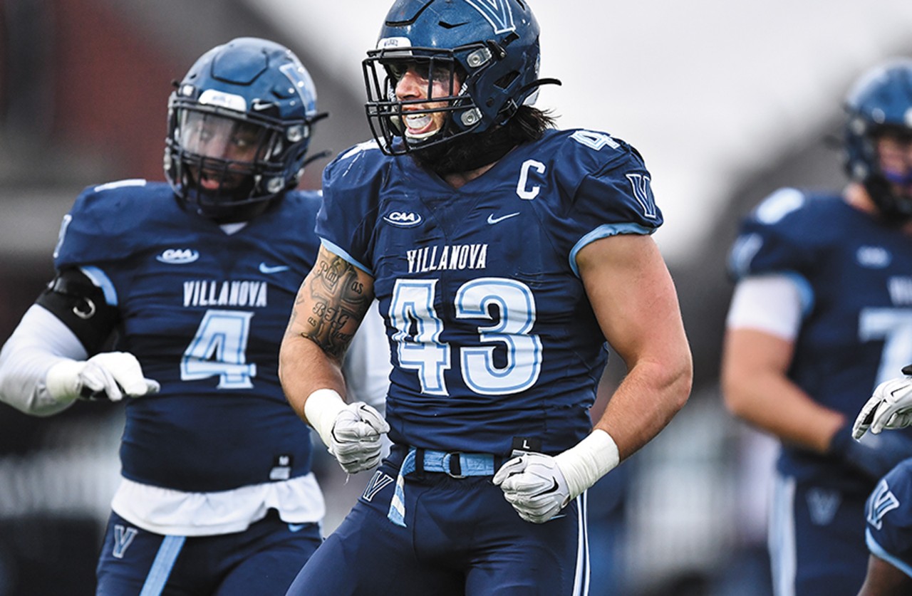 two Villanova football players suited up for play